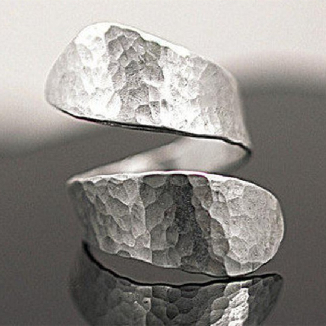 Modernist spiral-shaped ring with embossing