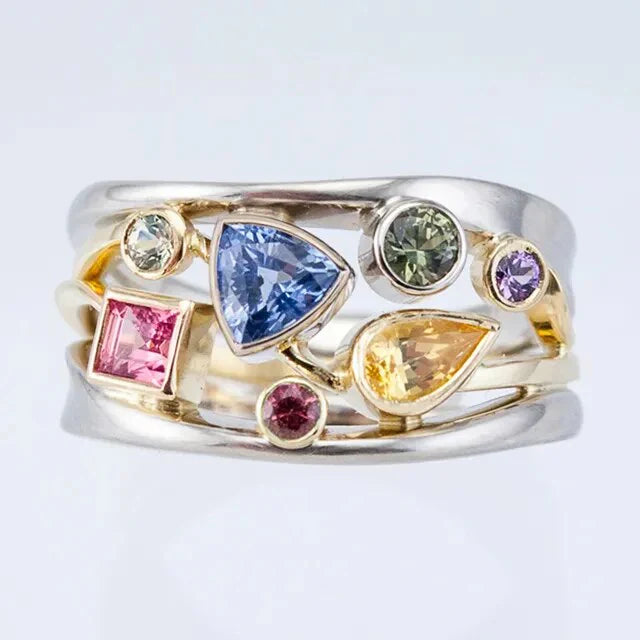 Ring aus 925er Silber und 18-karätigem Gold mit farbigen Strasssteinen