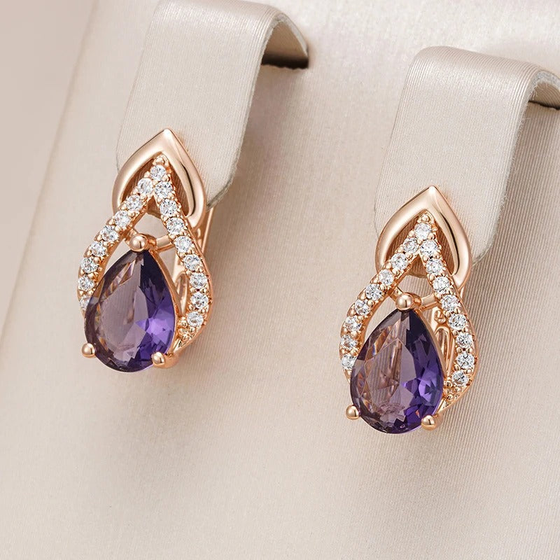 Tropfenförmige Ohrstecker mit amethystfarbenen Zirkonias aus 18 Karat Roségold - AC