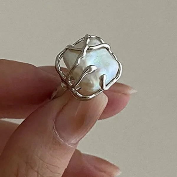 Abstrakter Ring mit eingelegter Perle und 925 Silber