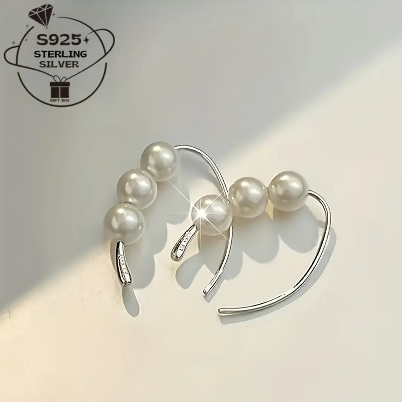 Ohrringe mit 3 Naturperlen auf 925 Silber.