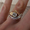18-karätiger Gold- und 925er Silber-Ring mit ineinander verschlungenen Ringen und Zirkonia-Einlage