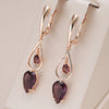 Ohrringe mit doppeltem Amethystzirkonia, 18 Karat Roségold - AC