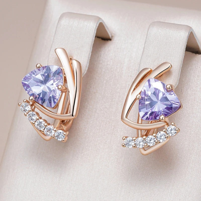Ohrstecker mit glänzendem lilafarbenem natürlichem Zirkon und kleinem weißem Zirkon aus 18 K Rosévergoldung - AC