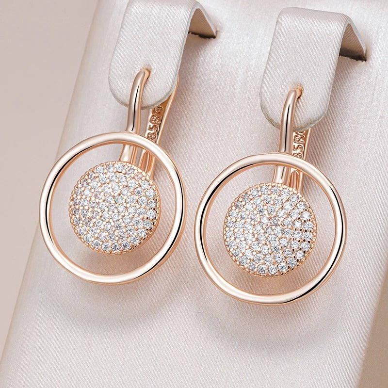 Ohrringe mit Kreisen und Zirkonen in 18 Karat Roségoldplattierung