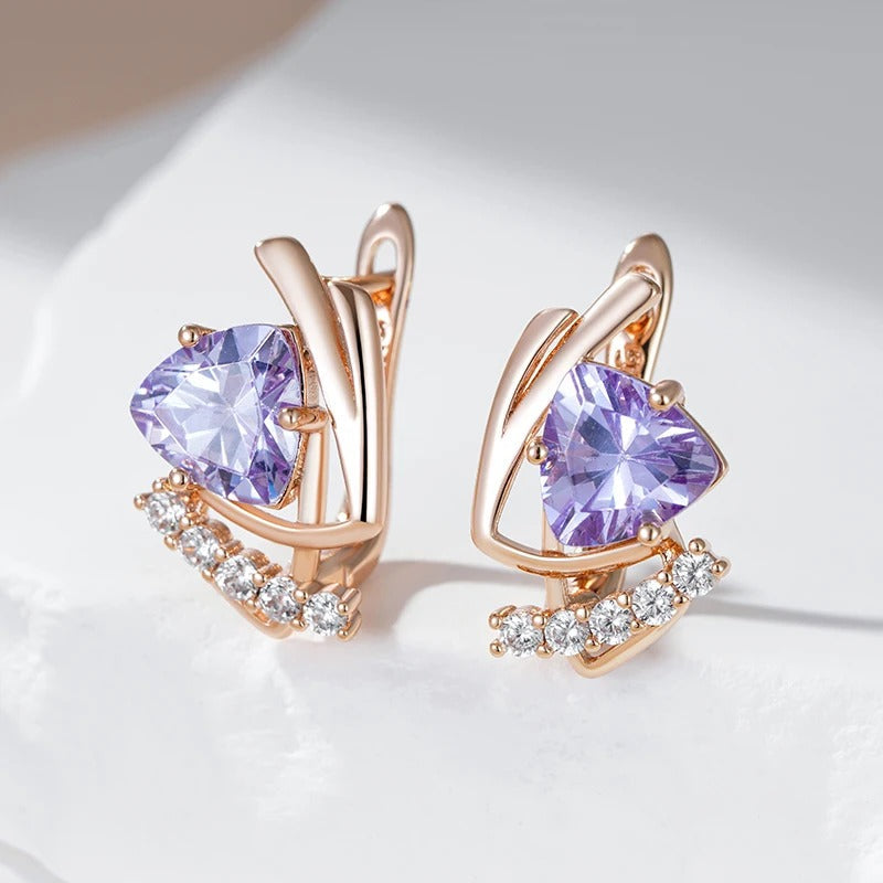 Ohrstecker mit glänzendem violettem natürlichem Zirkon und kleinem weißem Zirkon in 18K Roségoldplattierung