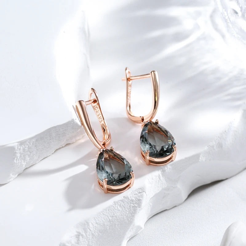 Neue Ohrringe mit grauem Kristall in 18K Roségold plattiert