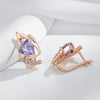 Ohrstecker mit glänzendem violettem natürlichem Zirkon und kleinem weißem Zirkon in 18K Roségoldplattierung