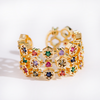 Verstellbarer Ring aus 18K Gold mit farbigen Zirkonsteinen